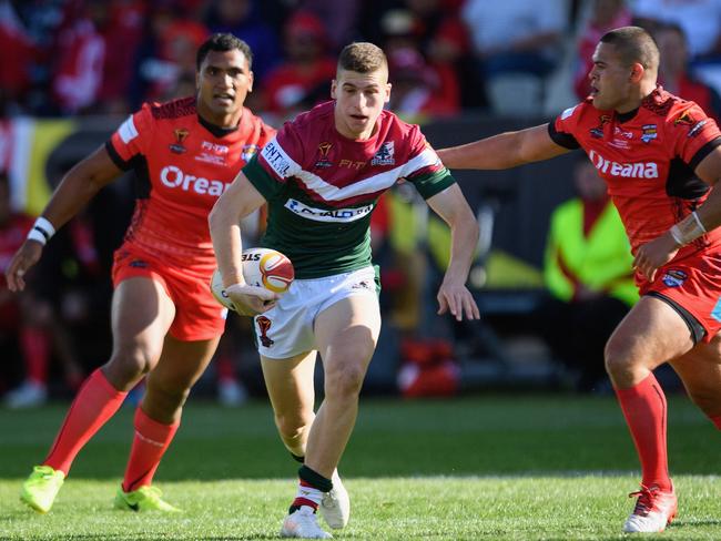 And taking on the Tongan big men at the World Cup. Picture: Getty Images