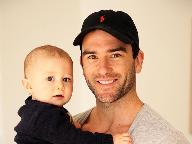 Jordan Lewis with his son Freddie, 1, after joining Melbourne, for Robbo feature story. Picture: Tim Carrafa