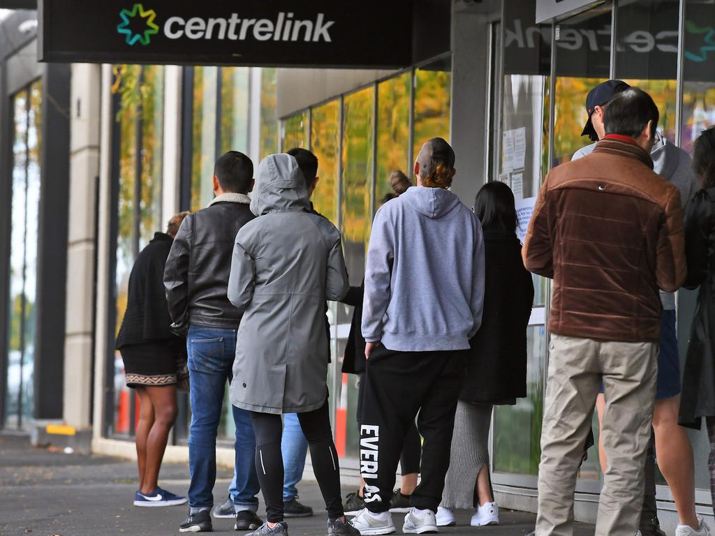 Tens of thousands of Australians queued outside Centrelink offices around the nation to register for JobKeeper and JobSeeker payments. Picture: William West/AFP