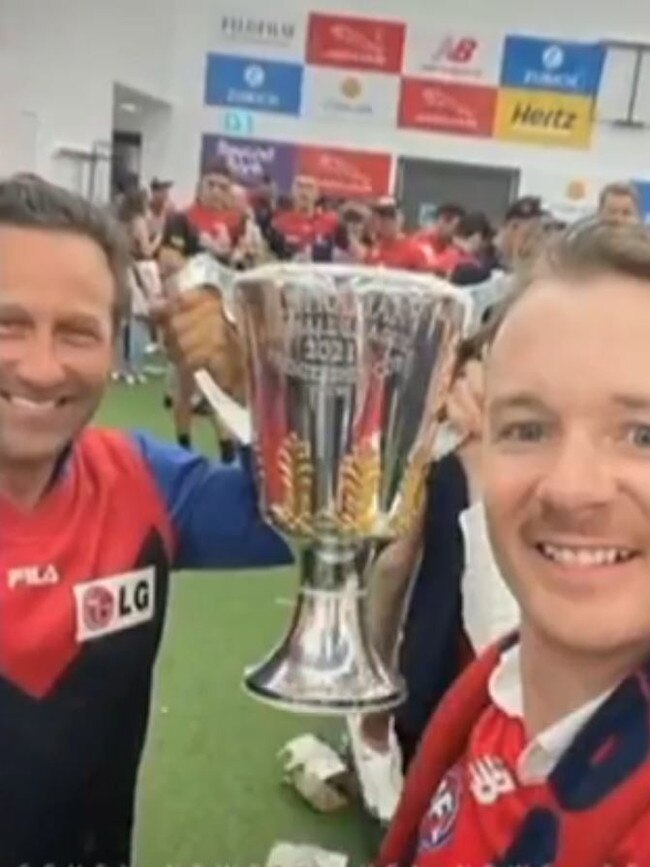 Mr Burbank and Mr Babbage pose with the premiership cup.