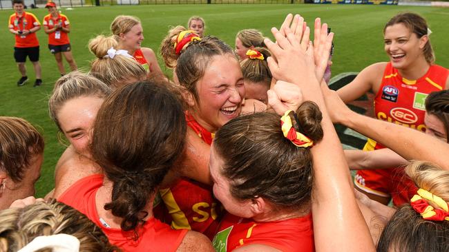 PERTH, AUSTRALIA - MARCH 15: Taylor Smith of the Suns celebrate the win with the team during the 2020 AFLW Round 06 match between the West Coast Eagles and the Gold Coast Suns at Mineral Resources Park on March 15, 2020 in Perth, Australia. (Photo by Daniel Carson/AFL Photos via Getty Images)