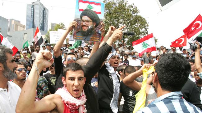 Palestinian supporters demonstrate in Melbourne against the current Israeli bombardment and invasion of the Gaza Strip.