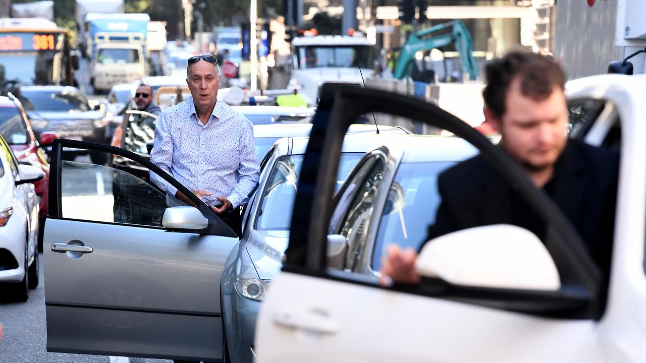 Motorists stuck in a traffic jam as Extinction Rebellion protesters block early morning peak hour traffic in Brisbane. Picture: AAP