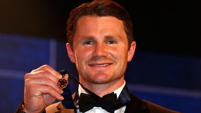 Patrick Dangerfield of the Cats holds the 2016 Brownlow Medal.