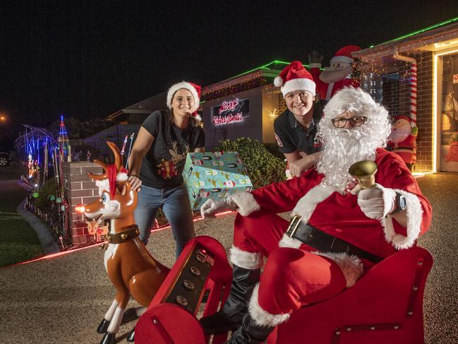 (from left) Kellie, Scott and Sam Iseppi. The Iseppi family Christmas lights display at & Lockyer St Kleinton. Friday, December 10, 2021. Picture: Nev Madsen.