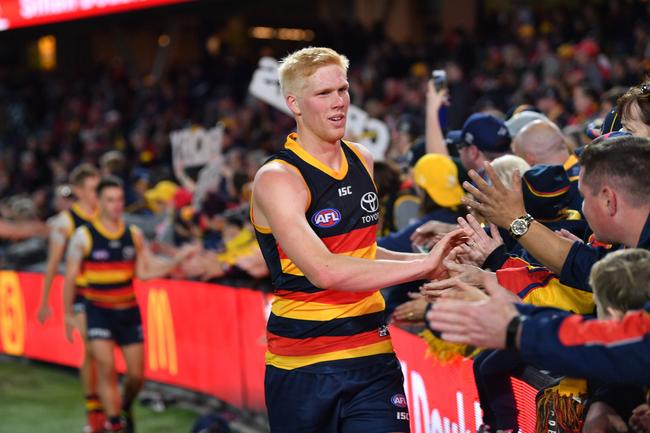 Adelaide’s Elliot Himmelberg celebrates with the crowd after the Crows beat Fremantle in their Round 7 match at the Adelaide Oval. Picture: David Mariuz/AAP