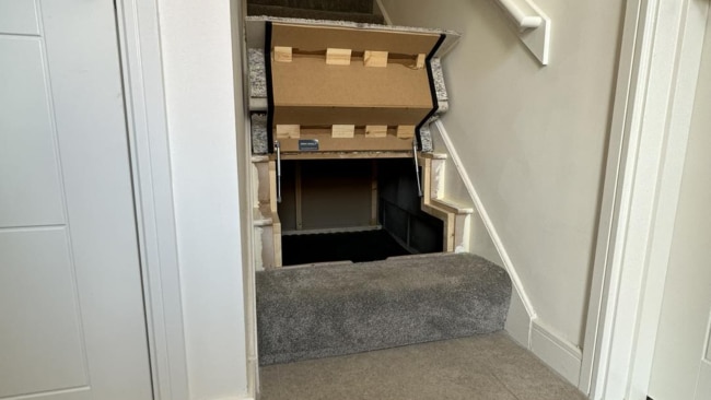 Shoe storage under deals stairs