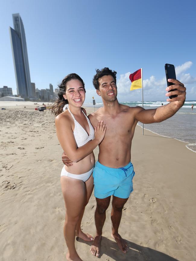 Caroline Mastry and Ernesto Villalba grab a selfie on a Gold Coast holiday. Pic by Luke Marsden.