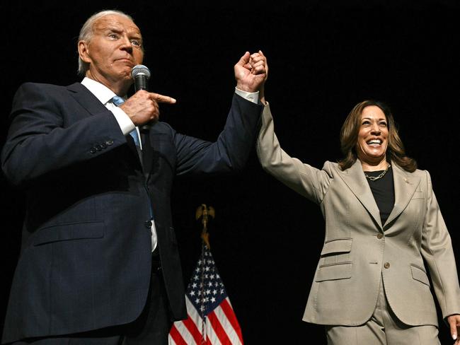 Joe Biden points to Vice President and Democratic presidential candidate Kamala Harris in the overflow room after they spoke at Prince George's Community College in Largo, Maryland. Picture: AFP