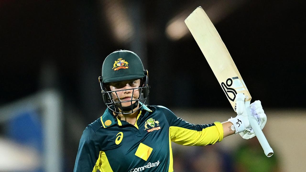 MACKAY, AUSTRALIA - SEPTEMBER 19: Phoebe Litchfield of Australia celebrates her half century during game one of the Women's T20 International Series between Australia and New Zealand at Great Barrier Reef Arena on September 19, 2024 in Mackay, Australia. (Photo by Albert Perez/Getty Images)