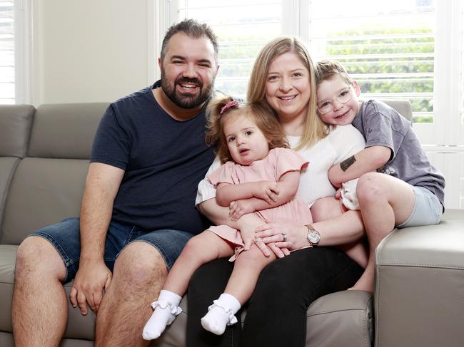 Steph Dimos and her husband George, and their kids Alex 5 and Elena 2. Picture: Tim Hunter.