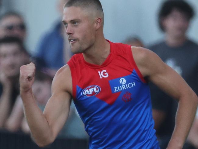 MELBOURNE, AUSTRALIA - FEBRUARY 28: Josh Schache of the Demons celebrates kicking a goal during the 2024 AFL Community Series match between Carlton Blues and Melbourne Demons at Ikon Park on February 28, 2024 in Melbourne, Australia. (Photo by Daniel Pockett/Getty Images)