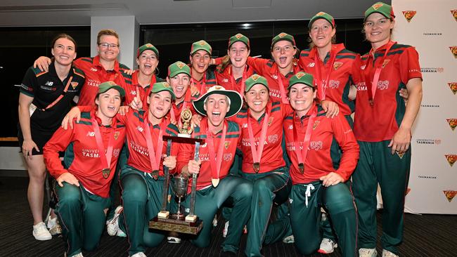 Tasmanian Tigers players celebrate the win with the trophy during the WNCL Final match between Tasmania and South Australia at Blundstone Arena, on February 25, 2023, in Hobart, Australia. (Photo by Steve Bell/Getty Images)