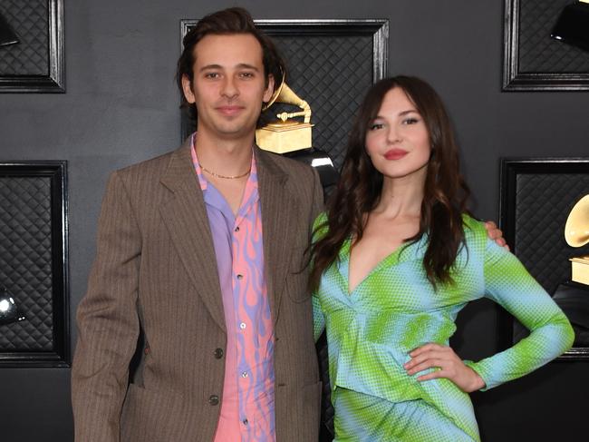 Actress Paige Elkington and Australian producer Harley "Flume" Streten arrive for the 62nd Annual Grammy Awards on January 26, 2020, in Los Angeles. (Photo by VALERIE MACON / AFP)