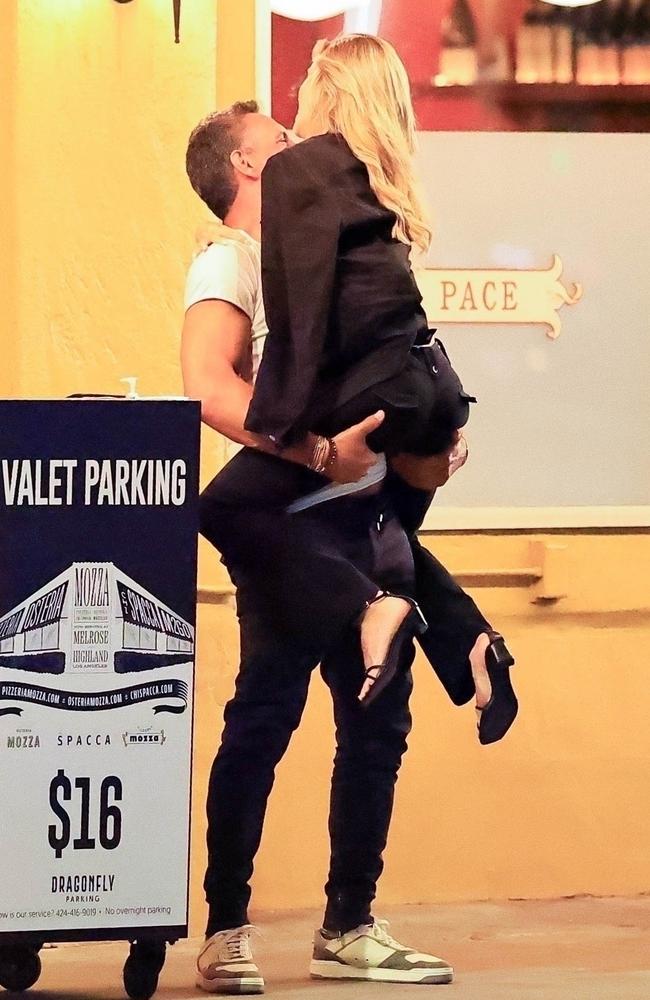 That’s one way to pass the time while you wait for the valet. Picture: BACKGRID