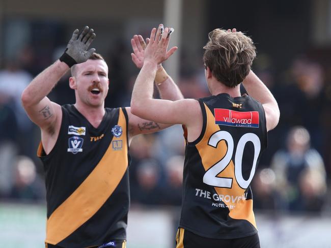 Grovedale’s Will Jeffery kicks a goal and celebrates with Patrick Knott Picture: Mark Wilson