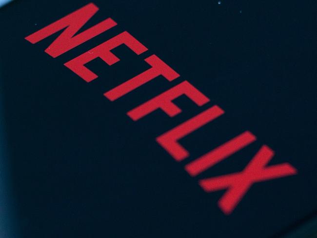 (FILES) In this file photo taken on July 10, 2019 the Netflix logo is seen on a phone in this photo illustration in Washington, DC. - Netflix said jANUARY 21, 2020 it added millions of new subscribers globally over the past quarter as it prepared up for a tougher competitive landscape, but scaled back its outlook for early 2020. The global television streaming giant beat expectations with a profit of $587 million in the fourth quarter of 2019 as revenue rose 31 percent from a year ago to $5.5 billion. (Photo by Alastair Pike / AFP)