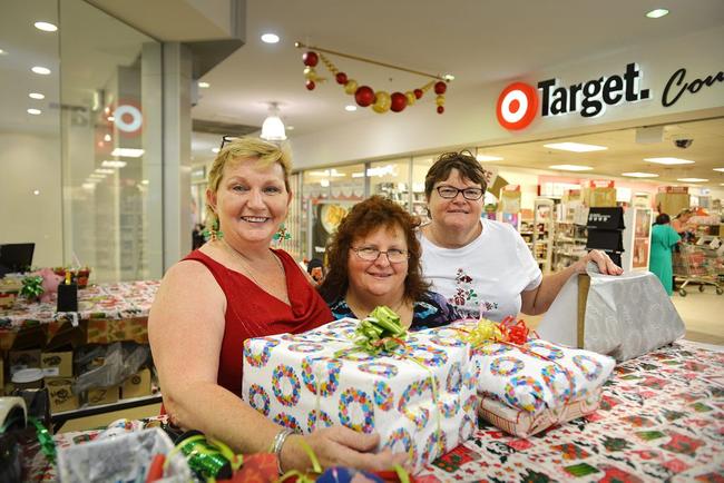 COMMUNITY: Diane Clift, Lyne Russell and Stephanie Vogler raise money for the Victory Church Christmas Day Community Banquet. Picture: Renee Albrecht