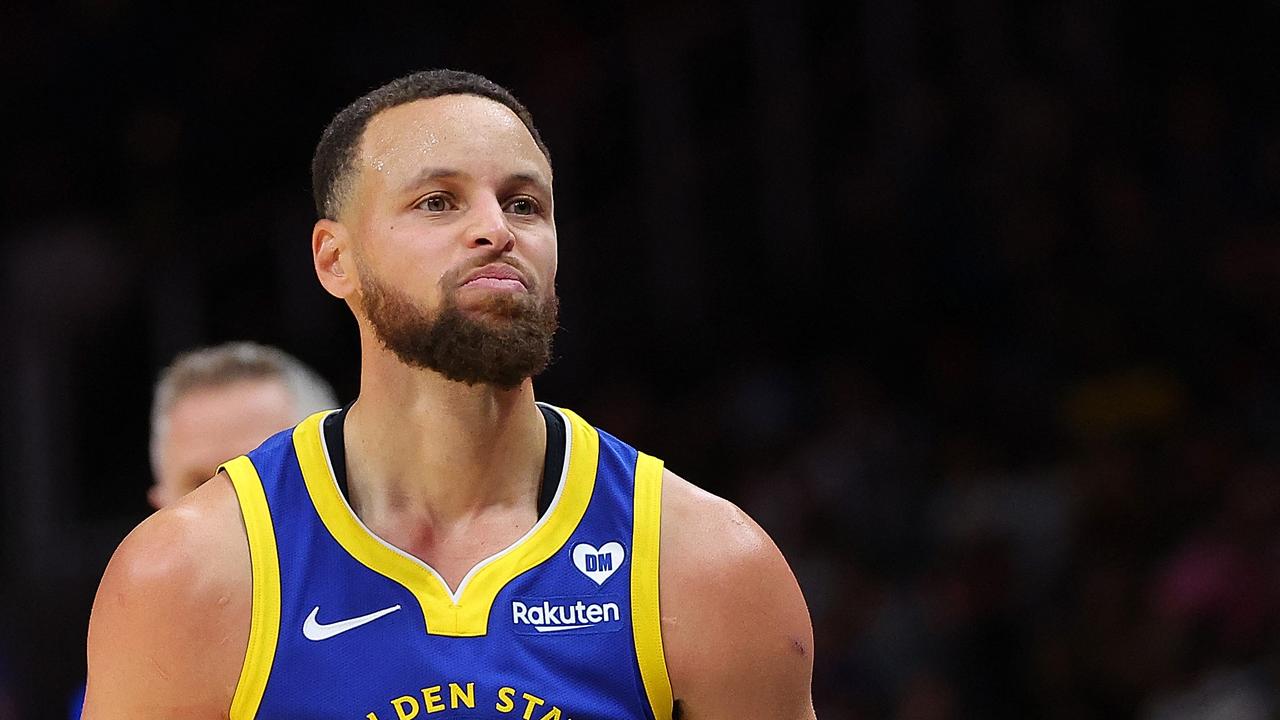 ATLANTA, GEORGIA - FEBRUARY 03: Stephen Curry #30 of the Golden State Warriors reacts after hitting a three-point basket against the Atlanta Hawks during the fourth quarter at State Farm Arena on February 03, 2024 in Atlanta, Georgia. NOTE TO USER: User expressly acknowledges and agrees that, by downloading and/or using this photograph, user is consenting to the terms and conditions of the Getty Images License Agreement. Kevin C. Cox/Getty Images/AFP (Photo by Kevin C. Cox / GETTY IMAGES NORTH AMERICA / Getty Images via AFP)