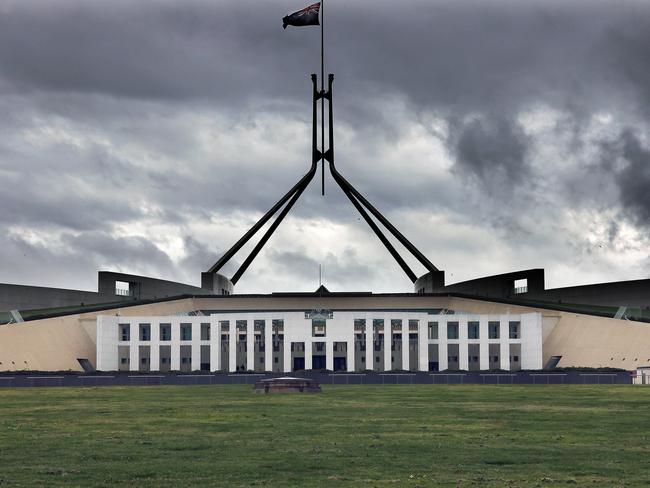 CANBERRA, AUSTRALIA NewsWire Photos - SEPTEMBER 20, 2021: COVID-19 and bad weather has kept most Canberrans inside as the ACT records 7 new cases. Storm clouds gather over Parliament House in Canberra.Picture: Newswire/Gary Ramage