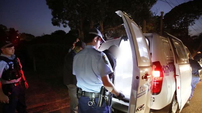 Police arrest a man at Booth St, Marsfield in relation to last Friday's Parramatta Police Headquarters shooting. Picture: NSW Police