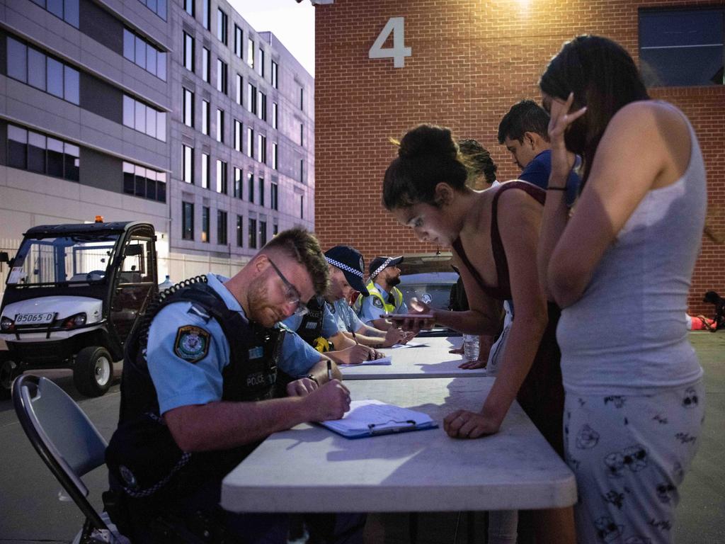 Evacuees photographed inside of the exhibition hall where they are staying. Picture: Flavio Brancaleone