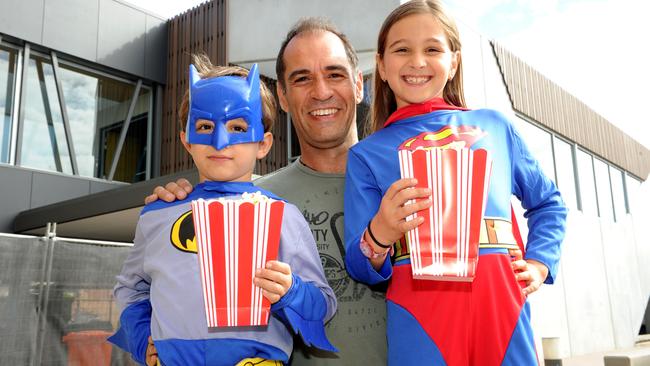 The new Greater Union Film House cinema is opening in Glenelg next week. One of the films is Batman v Superman. Ellie, 8, and Aidon, 5, who are looking forward to the film with dad Con Maios at Glenelg.