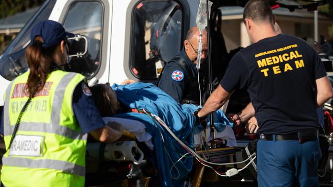Mr Franc is loaded into a helicopter to be flown to hospital. Picture: Charlie Coquillard