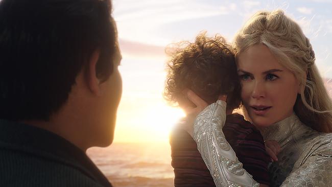 Queen Atlanna (played by Nicole Kidman) protects a young Arthur Curry in a scene from film Aquaman. Picture: Warner Bros Pictures.