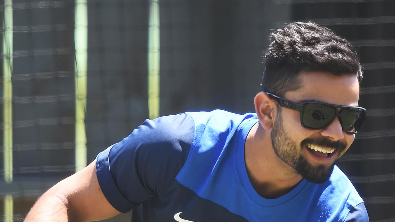 Indian cricketer Virat Kohli smiles during a nets session. Picture: AAP