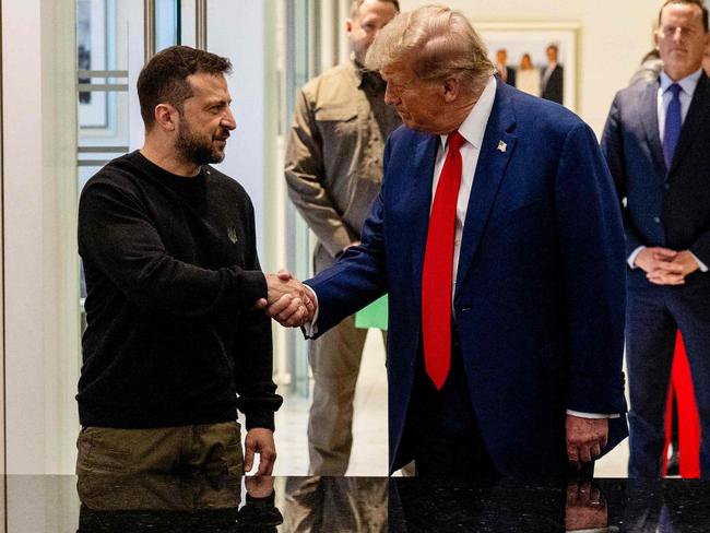 (L-R) Ukrainian President Volodymyr Zelenskyy and Donald Trump, shake hands during a meeting on September 27, 2024 in New York City. Ukraine is worried about the impact of a Trump presidency on military aid. Picture: Getty Images via AFP