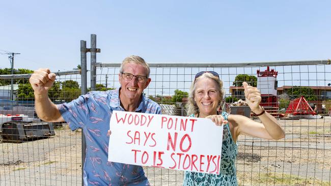 Derek Catterall and Julia Nuske pose for a photograph at the development site bounded by Kate Street, Lila Street, and Gayundah Esplanade in Woody Point. PHOTO: AAP/Richard Walker