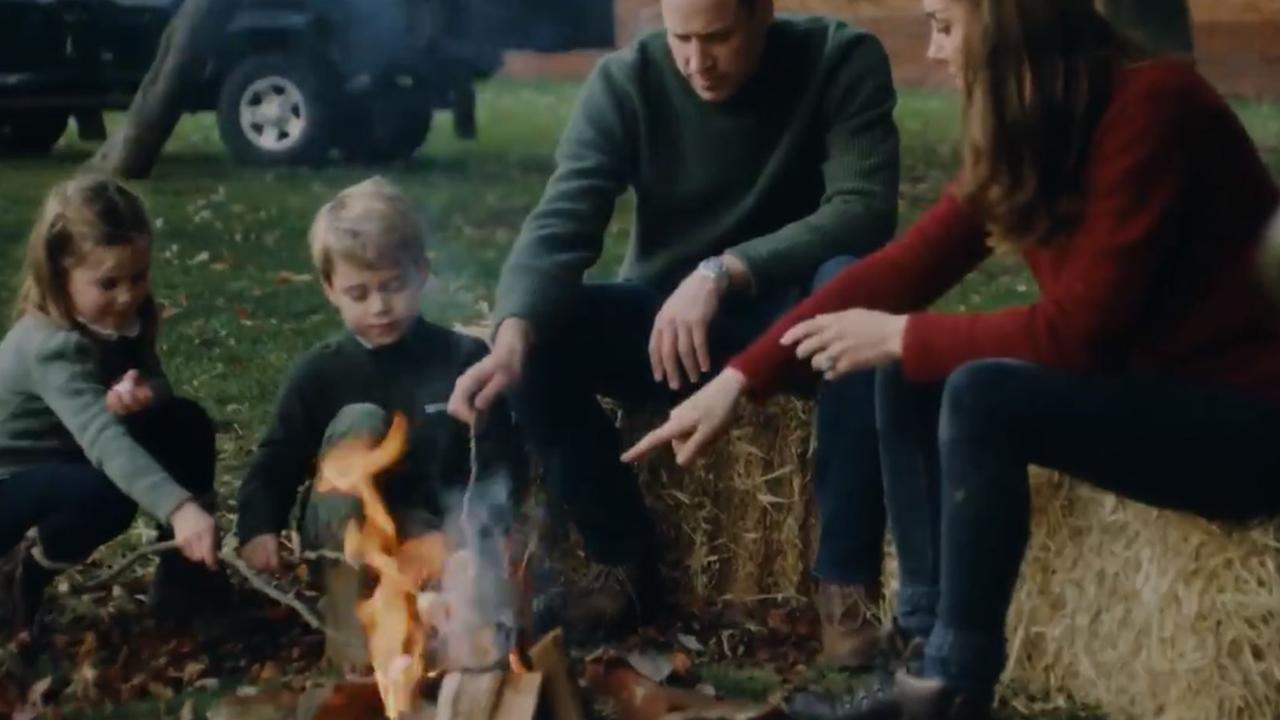 William and Kate sitting on hay bales while roasting marshmallows with the kids – just like normal people. Picture: Twitter/@kensingtonroyal