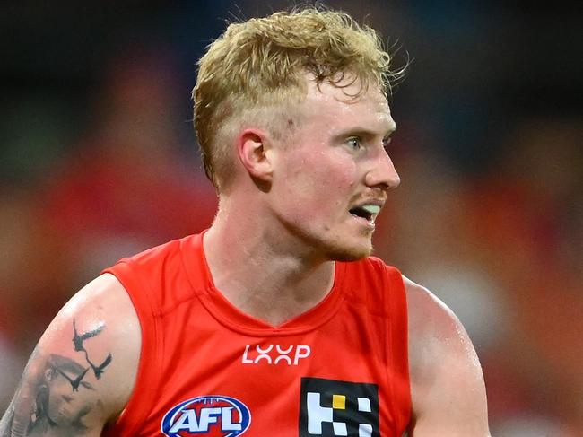 GOLD COAST, AUSTRALIA - FEBRUARY 28: John Noble of the Suns looks to kick during the 2025 AAMI AFL Community Series match between Gold Coast Suns and Sydney Swans at People First Stadium on February 28, 2025 in Gold Coast, Australia. (Photo by Matt Roberts/AFL Photos/via Getty Images)