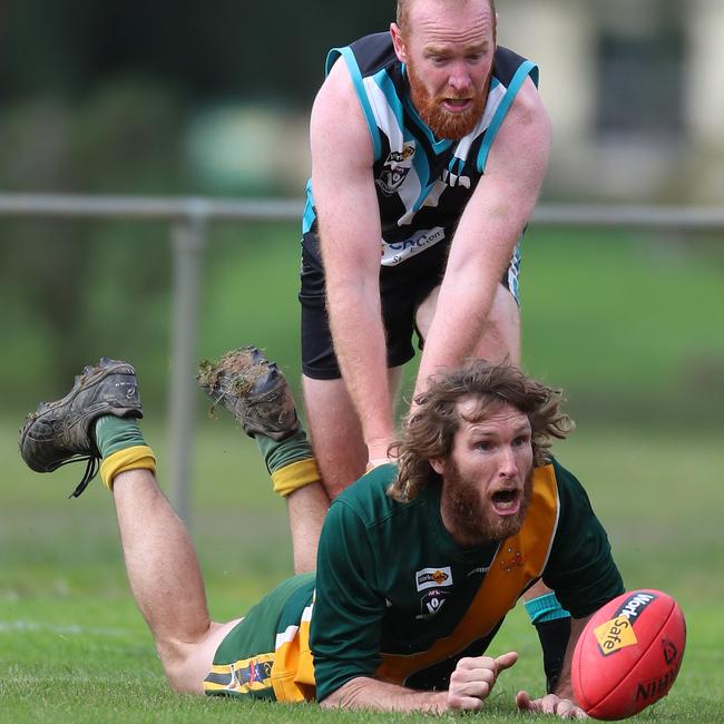 Murchison-Toolamba’s Jacob Ewart attempts to gather the ball.