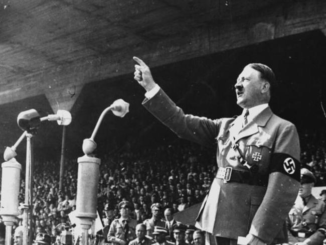 Ticket to Reich ... German Chancellor Adolf Hitler gestures during a speech in May 1937.