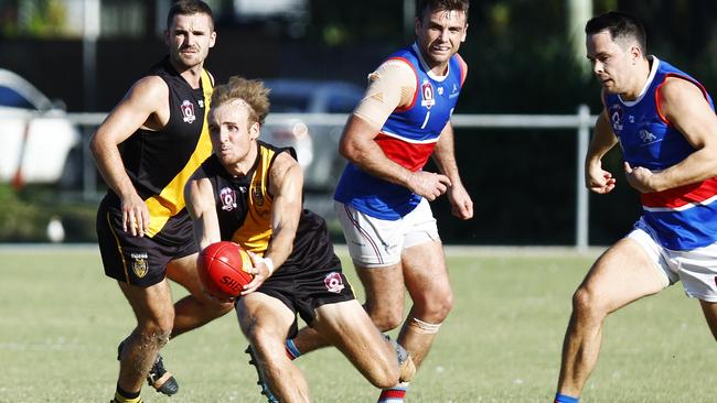 Tigers' James Neale controls the ball in the AFL Cairns men's premiership match between the North Cairns Tigers and the Central Trinity Beach Bulldogs, held at Watson's Oval Manunda. Picture: Brendan Radke