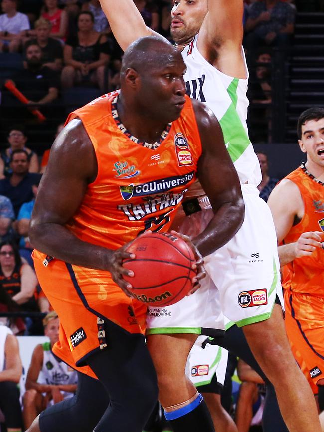 Taipans' Nate Jawai matches up against Phoenix's Tai Wesley in the National Basketball League (NBL) New Year's Eve match between the Cairns Taipans and the South East Melbourne Phoenix, held at the Cairns Convention Centre. PICTURE: BRENDAN RADKE