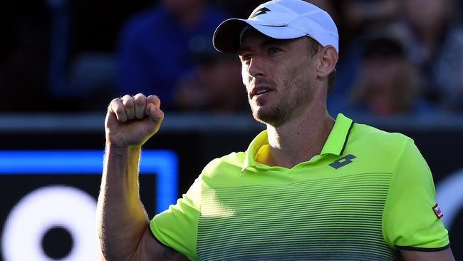 John Millman celebrates beating Borna Coric at the Australian Open. Picture: AAP