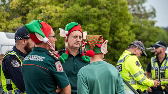 Paramedics wait as Santa prepares to visit Casuarina Square. Picture: Pema Tamang Pakhrin