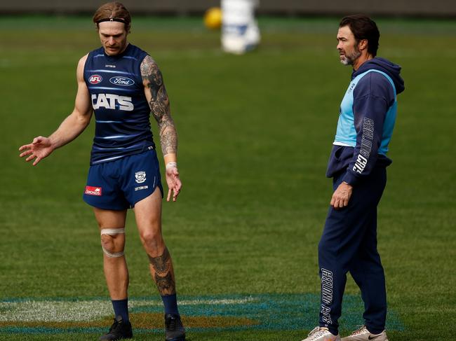 Star Cat Tom Stewart with coach Chris Scott. Picture: Michael Willson/AFL Photos