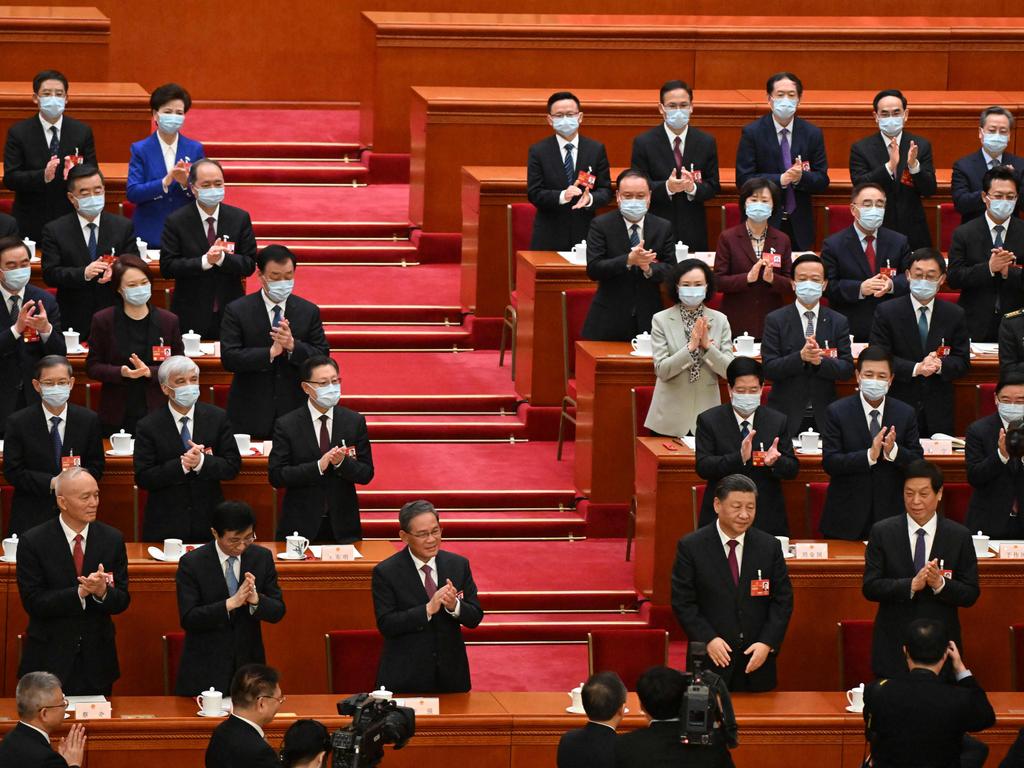 A digital monitor on the edge of the stage proclaimed the final tally — all 2,952 votes had been cast in favour of awarding Xi another term in office.