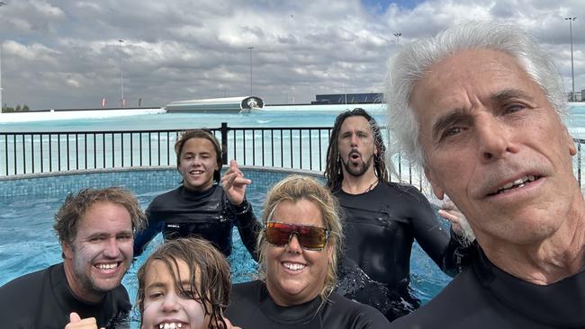 Khai with his family, Tim, Jett, Kate, Adam and Peter at the wave pool in Melbourne.