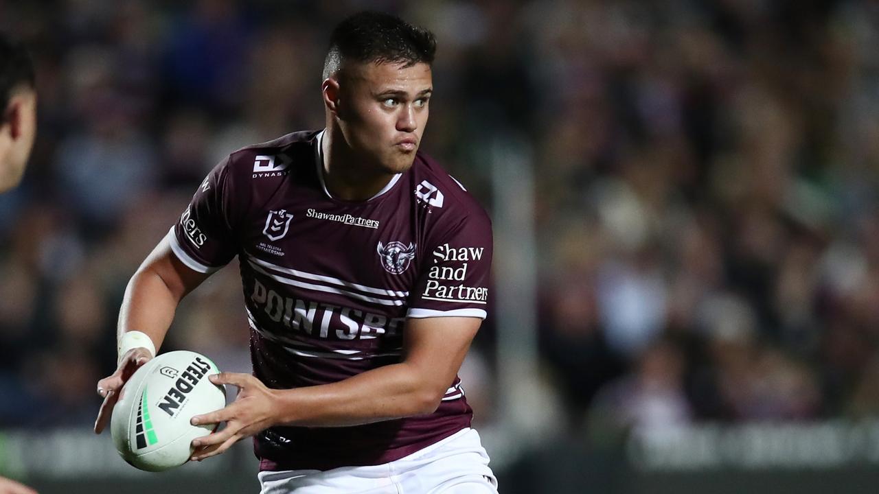 SYDNEY, AUSTRALIA - JUNE 09: Josh Schuster of the Sea Eagles passes the ball during the round 15 NRL match between Manly Sea Eagles and Dolphins at 4 Pines Park on June 09, 2023 in Sydney, Australia. (Photo by Jason McCawley/Getty Images)