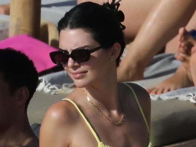 ONE TIME WEB USE ONLY - FEE APPLIES FOR REUSE -  AU_1648528 - ** RIGHTS: ONLY AUSTRALIA, NEW ZEALAND ** Mykonos, GREECE  - BGUK_1648498 -  Sexy Reality star Kendall Jenner with her yellow bikini spent the day at the beach with pals Fai Khadra and Joan Smalls and large entourage of friends on holiday in Mykonos island.  Pictured: Kendall Jenner   BACKGRID Australia 8 JULY 2019   Phone: + 61 419 847 429 Email:  sarah@backgrid.com.au  Picture: Backgrid