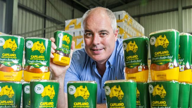 Capilano Honey chief operating officer Ben McKee with the Capilano Drought and Bushfire Relief pack. Picture: AAP