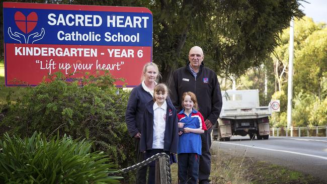 Cherie Manning, daughter Hollie, principal Luch Brighella and student Georgie Burgess are not happy about the 80km/h speed limit in front of their school. Picture: EDDIE SAFARIK