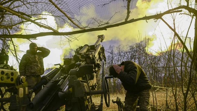 Ukrainian servicemen fire a M777 howitzer at Russian positions near Bakhmut. Picture: AFP