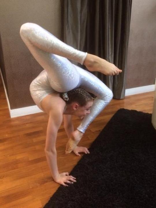 A girl shows off her contortionist skills.