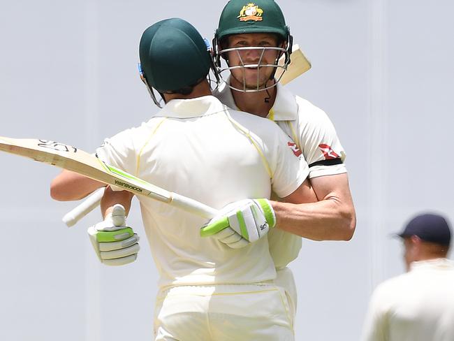 David Warner and Cameron Bancroft celebrate completing Australia’s first Test victory.